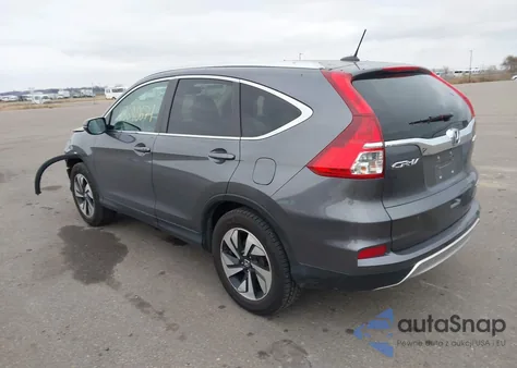 2015 Honda Cr-V Touring z USA, uszkodzony, nr VIN 5J6RM4H97FL132857